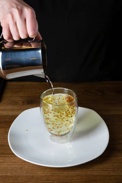 istock Pouring hot water in granules buckwheat tea 1389317956