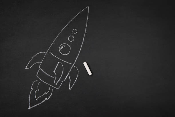 istock Chalk Drawing of Rocket on Blackboard 1389320867