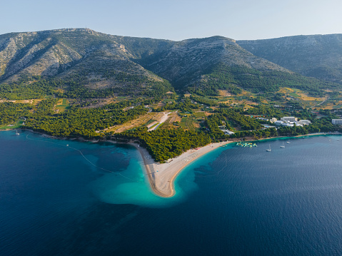 Aerial view of Zlatni rat beach on Adriatic sea, Bol, Brac island, Croatia. Summer vacation resort