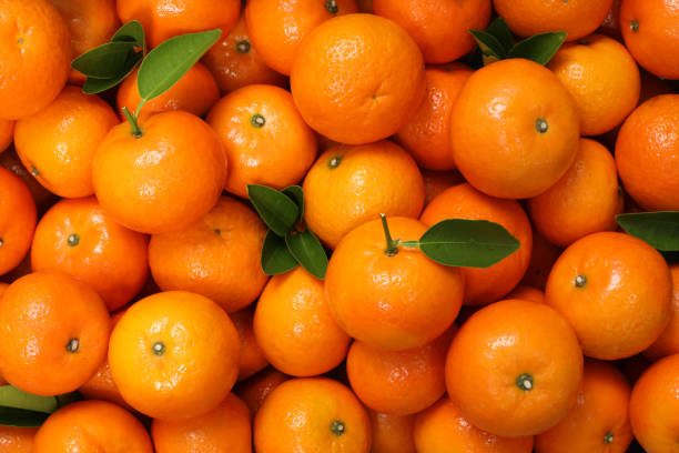 istock oranges, healthy fruit, mandarin oranges, vitamin C, many oranges background, full frame 1389322782