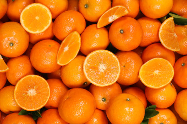 istock oranges, healthy fruit, mandarin oranges, vitamin C, multi orange background, halved oranges 1389322817