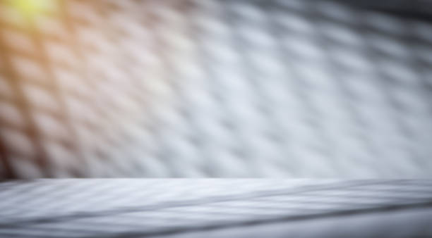 istock Abstract shadow and striped diagonal light blur background on white wall from window 1389323224