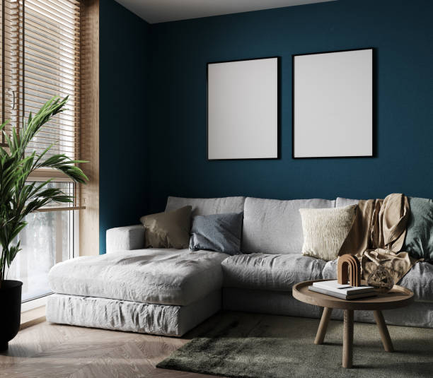 istock Two poster mockup with vertical frames on empty blue wall in stylish living room interior. 3d render 1389328718