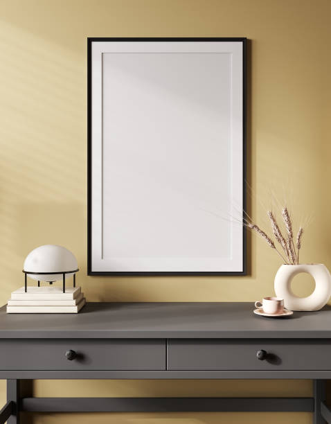 istock Mock-up poster frame with home decoration on the desk, yellow wall. 3d rendering 1389329621