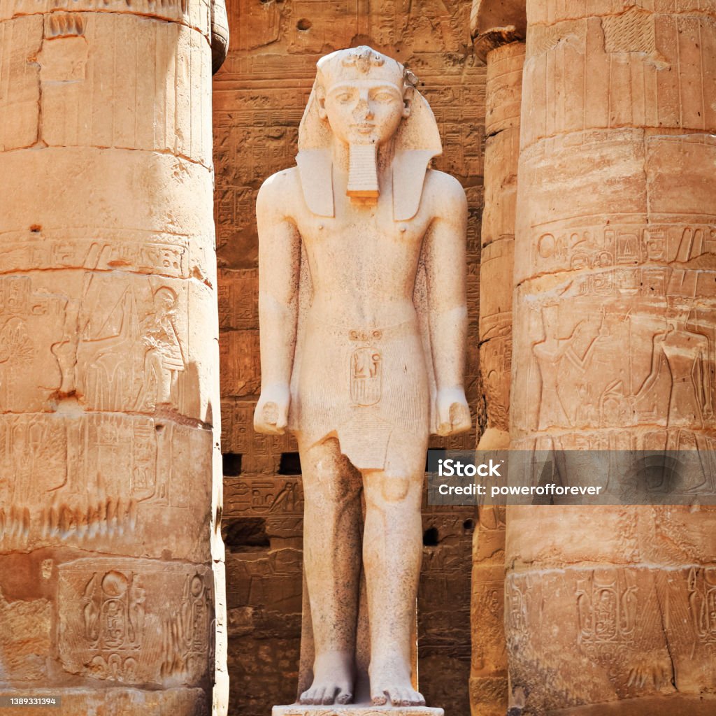 Statue of Rameses II in the Great Court of Rameses II (Peristyle Courtyard) at Luxor Temple in Luxor, Egypt Statue of Rameses II in the Great Court of Rameses II (Peristyle Courtyard) at Luxor Temple in Luxor, Egypt. Rameses II Stock Photo