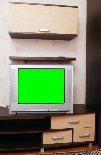 istock Old TV with a green screen in the interior. 1389332189