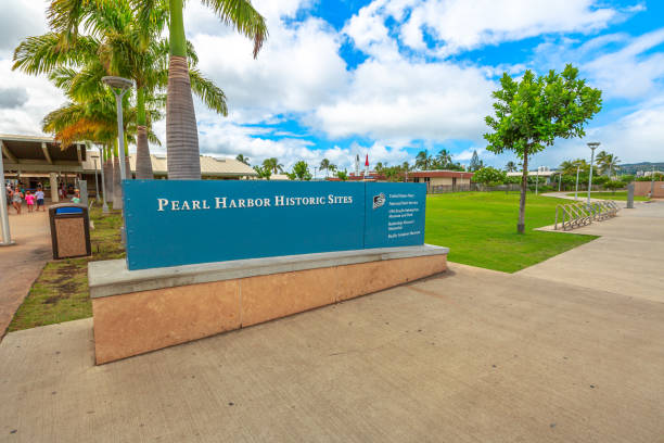 Pearl Harbor Historic Sites in Hawaii HONOLULU, OAHU, HAWAII, United States - AUGUST 21, 2016: entrance gate of the Pearl Harbor Historic Sites in Oahu island of Hawaii. American historic and patriotic museum. pearl harbor stock pictures, royalty-free photos & images