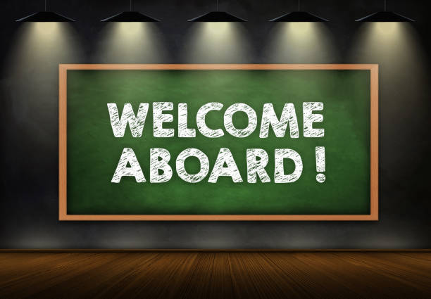 welcome aboard - friendly message on chalkboard stock photo