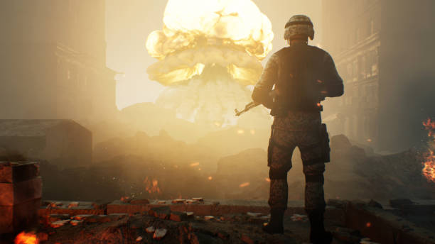 Soldier against a nuclear explosion 3D render of a soldier with a machine gun, standing in the ruins of a ruined city blazing with fire after a bombing and looking at a nuclear explosion mariupol stock pictures, royalty-free photos & images