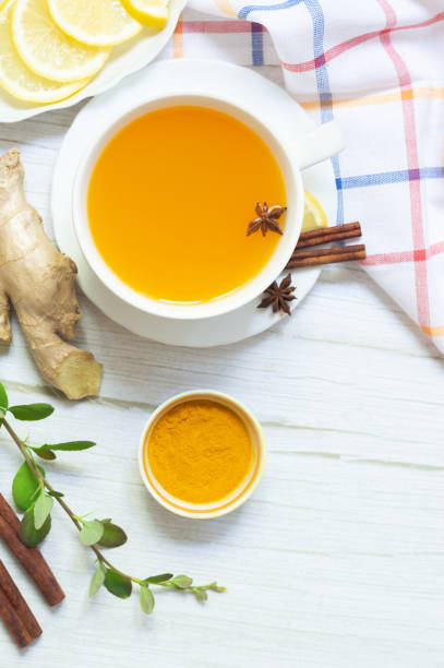istock Hot Drink with Turmeric Powder with Ginger Honey and Lemon 1389346080