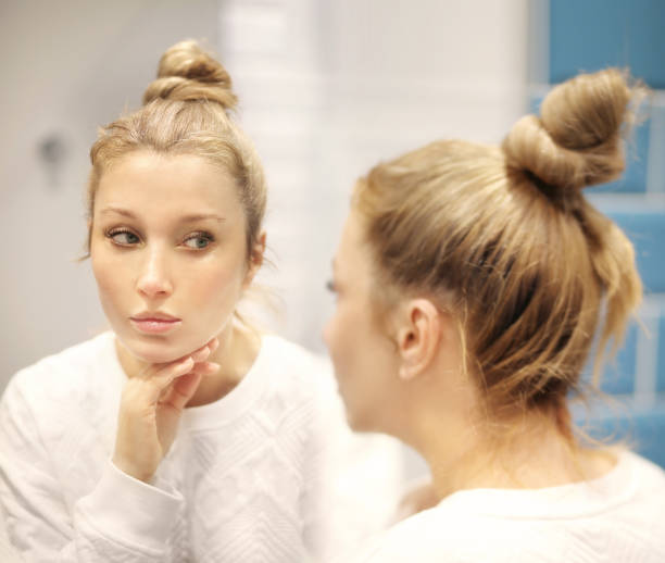 istock Applying the cream.Magic anti-aging cream. 1389349629