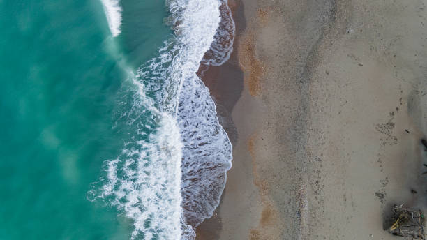 istock holiday on the wild beach with waves aerial view 1389356033