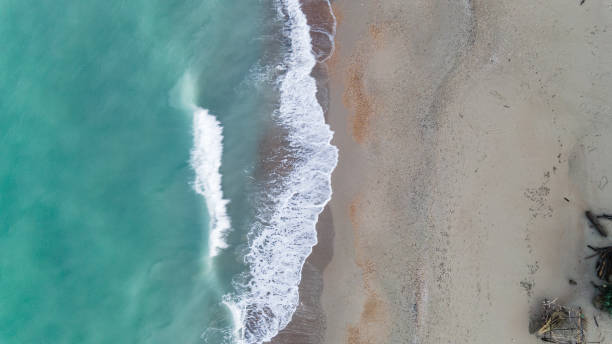 istock holiday on the wild beach with waves aerial view 1389356115
