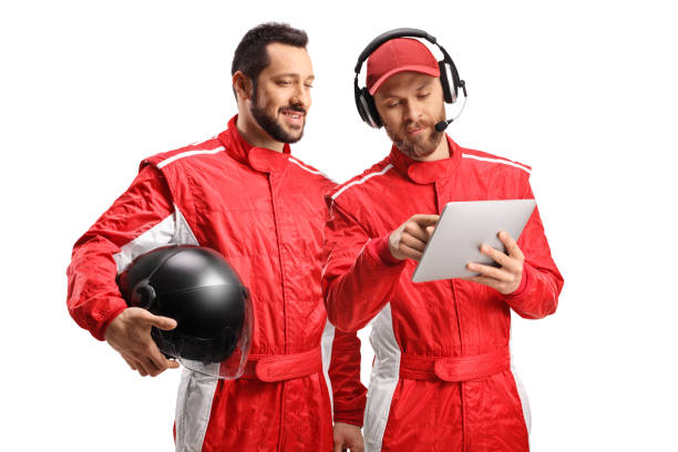 istock Driver and a team member looking at a tablet 1389356953