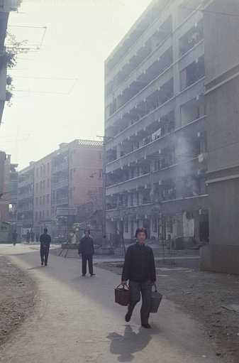Beijing, China, 1975. Street scene with locals in a residential area of Beijing.
