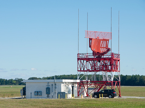 Airport surveillance radar antenna model ASR-11 at Des Moines International Airport, Des Moines, Iowa, USA. Provides near airport and ground data on aircraft to air traffic controllers.
