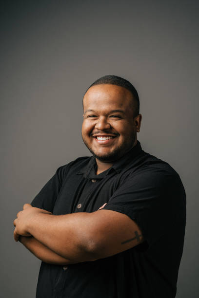 istock Portrait of a smiling man in the studio 1389361409