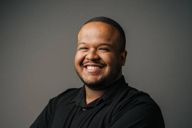 istock Portrait of a smiling man in the studio 1389361417