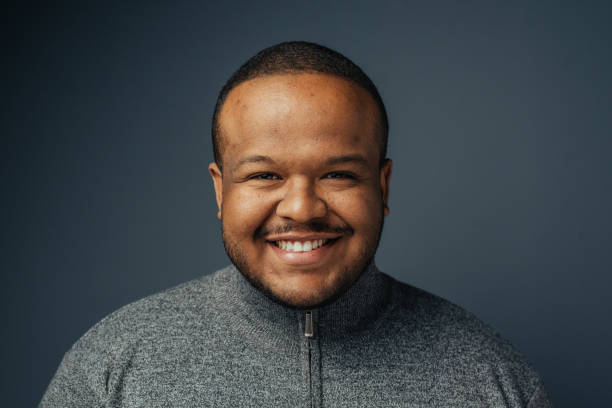 istock Portrait of a smiling black man 1389361480