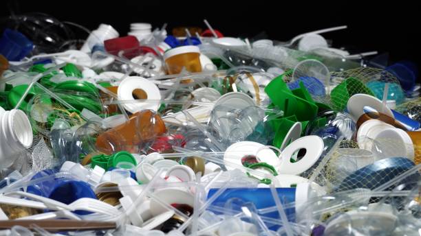 Plastic garbage from one household. Waste discarded or picked up from marine. City home trash made of plastic. Empty used bottles and cups create environmental pollution and ecological problem. stock photo