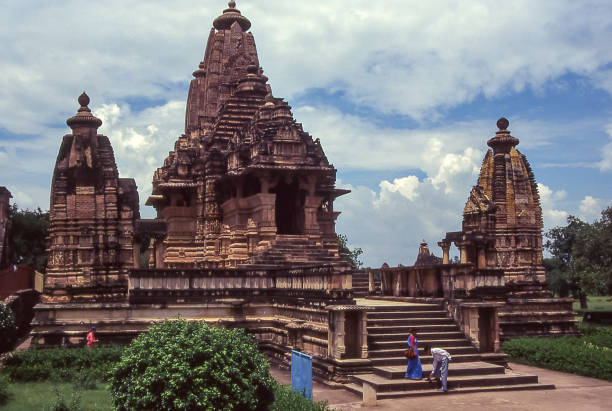 Khajuraho, India - aug 12, 1996: overall view of the Lakshmana temple in Khajuraho with two of the four surrounding shrines.   Vintage photo. Historical archive photo.