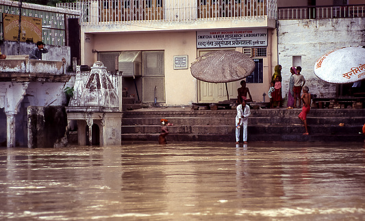 Varanasi, India - aug 14, 1996: the flood of the Ganges almost completely submerged the ghats where pilgrims flocked.   Vintage photo. Historical archive photo.