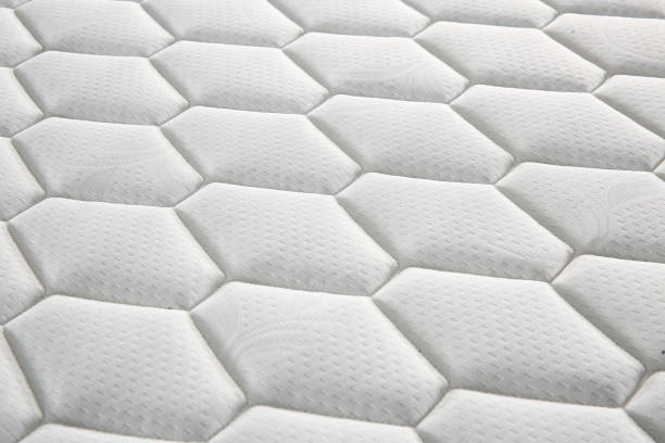 istock Closeup mattress texture background comfortable bed topper fabric bed sheet 1389371957