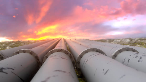 condotte industriali e valvole sullo sfondo del cielo al tramonto, banner. - petroleum export foto e immagini stock