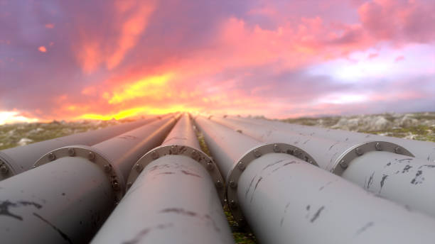Industrial pipelines and valves on sunset sky background, banner. Highly detailed gas pipes. pipeline stock pictures, royalty-free photos & images