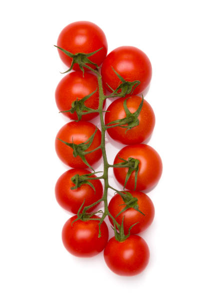istock Ripe red cherry tomatoes on white background. 1389381501