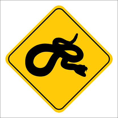 Vector illustration of a black and gold rattlesnake road sign.