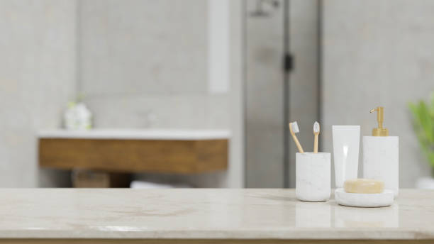 istock White marble bathroom countertop with a ceramic bathroom product container 1389401209