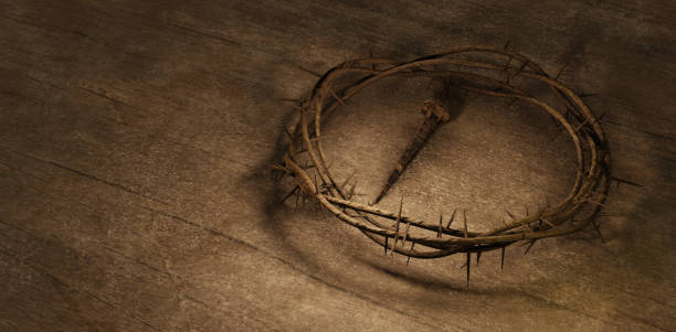 istock Nail and Crown of Thorns Banner Background with CopySpace Text 1389401571