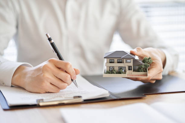 Asian businessman making a real estate contract stock photo