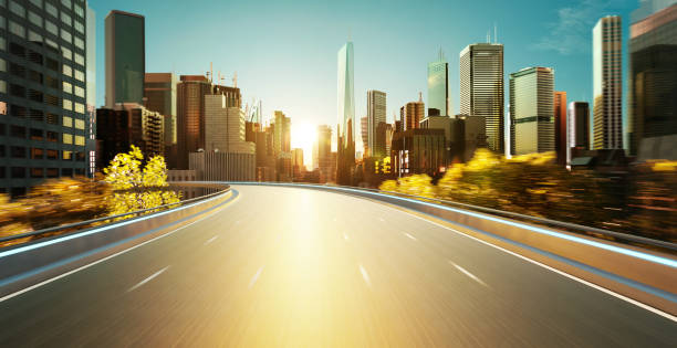 istock Highway overpass motion blur with cityscape skyline 1389408804