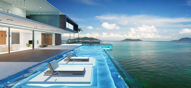 Luxury villa exterior design with beautiful seascape at the infinity pool. 3d rendering