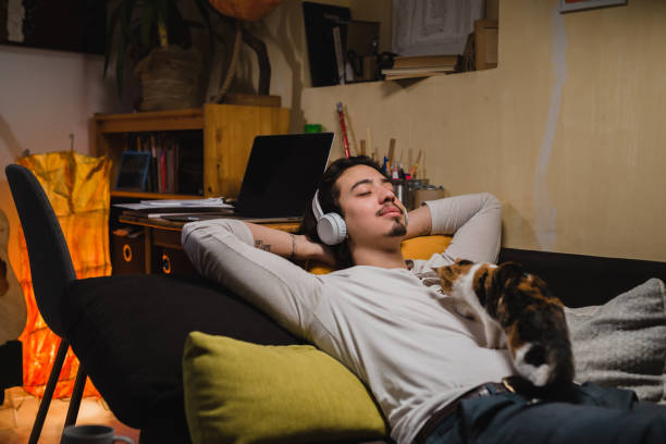 istock man relaxing at home 1389423168