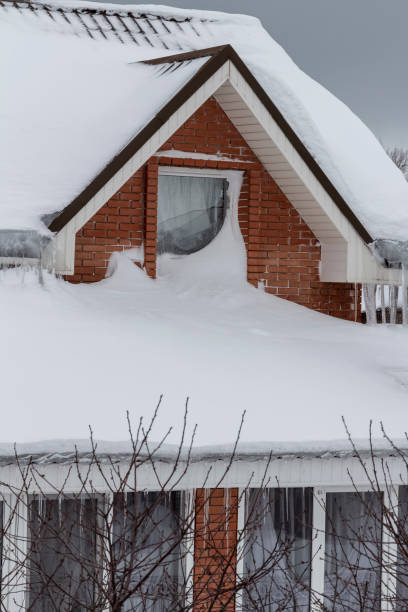 istock The roof is under the snow 1389425246