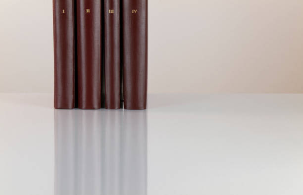 istock Old style books against white background 1389427073