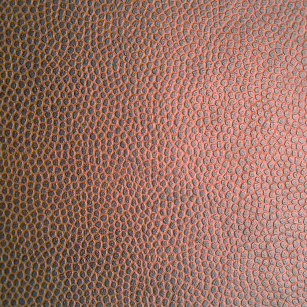 istock Artificial textured brown leather close-up.Texture or background 1389430295