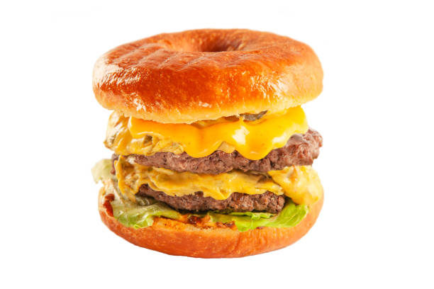 istock Double decker donut bun burger with beef patties and dressing. 1389431550