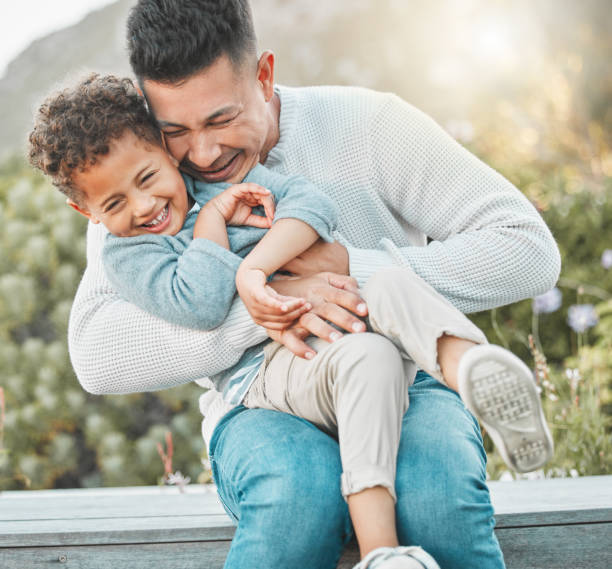 istock Shot of a father and son having fun outside 1389438538