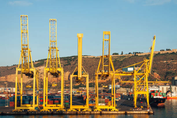 istock Freight Cranes in an industrial cargo port. 1389444421