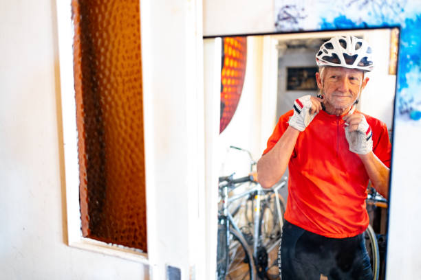 istock senior man wearing helmet for cycling 1389444648