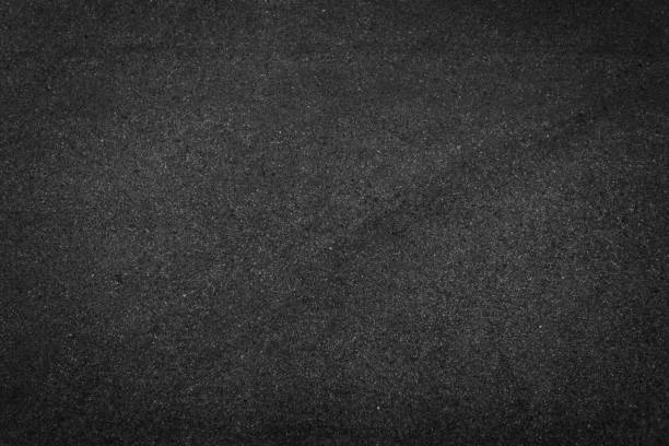 istock Background texture of rough asphalt top view