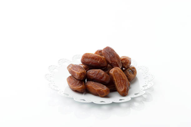 istock Tunisian Dates or Kurma Tunisia Isolated on White Background 1389446039