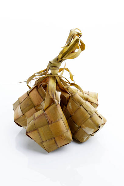 istock Ketupat Rice Dumpling Special Dish served at Eid Mubarak.Isolated on White Background. 1389446297