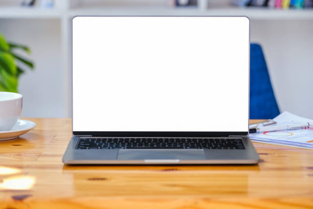 istock A white screen computer on a wooden table can carry text messages or images on a blank screen. 1389446478