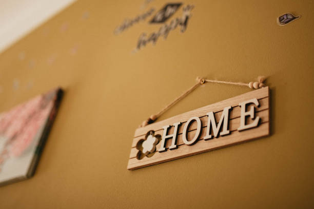 istock Follow your dreams. Home sign on the wall. 1389449519