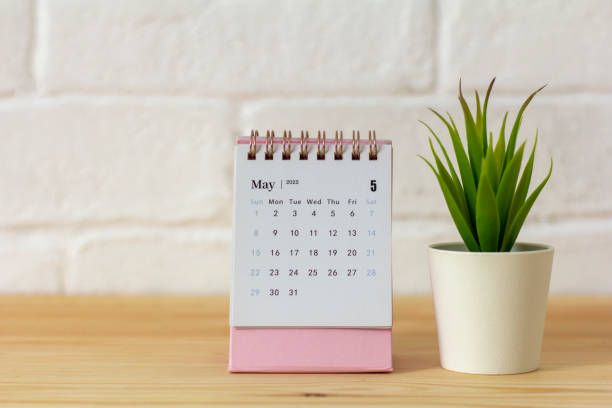 istock Desktop calendar for May 2022 for planning.Spring is in the yard. 1389449542